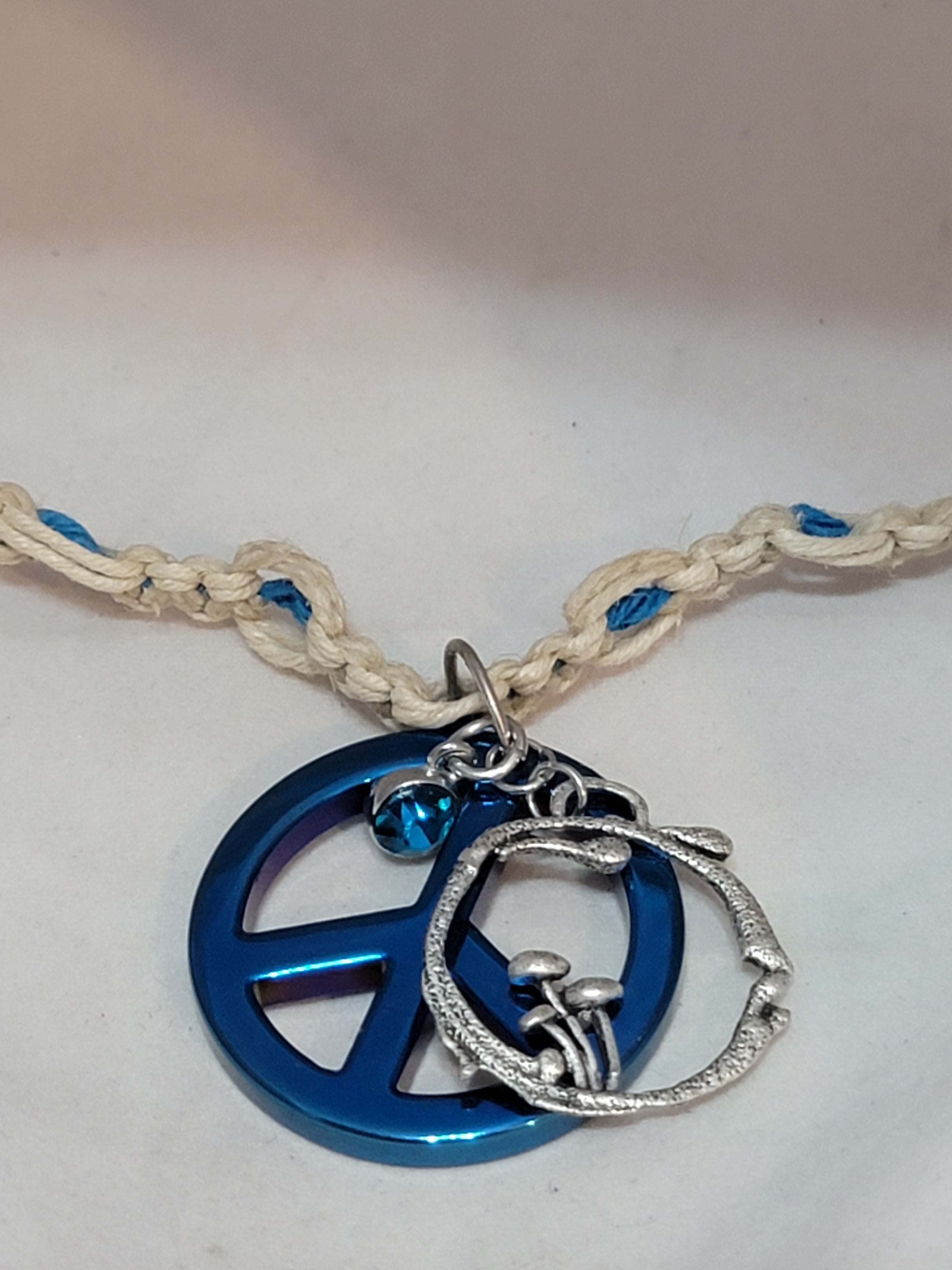 Blue Hematite with Peace Sign, Mushroom, & Blue Crystal Necklace
